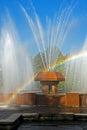 Rainbow in the waterdrops of a fountain