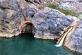 Rainbow Waterfall And A Cave