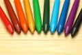 Rainbow wax crayons on wood Royalty Free Stock Photo