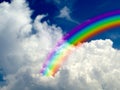 rainbow in white cloud blue sky background Royalty Free Stock Photo