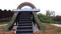 Rainbow and white cloud replication in the park