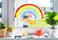 Rainbow on window during quarantine at home Royalty Free Stock Photo