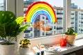 Rainbow on window during quarantine at home. Royalty Free Stock Photo