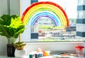Rainbow on window during quarantine at home. Royalty Free Stock Photo