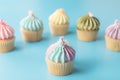 Rainbows cupcake muffin on blue background