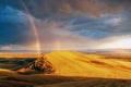 Rainbows over the hills after rain in Khakassia