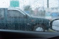 Raindrop water on Beside Windshield car in rainy season