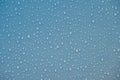 Raindrops on blue plastic film Royalty Free Stock Photo