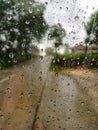 The raindrops on the car window form a beautiful and attractive silhouette