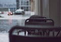 raindrops on chairs in the street Royalty Free Stock Photo