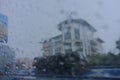 Raindrops falling on glass, abstract blurs- monsoon stock image of Kolkata formerly Calcutta city , West Bengal, India Royalty Free Stock Photo