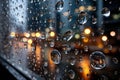 Raindrops on glass with blurred city lights Royalty Free Stock Photo