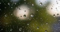 Raindrops on a glass surface create Royalty Free Stock Photo