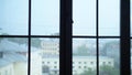 Raindrops on glass window with city view. blur, copy space Royalty Free Stock Photo