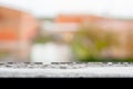 Raindrops on home surfaces during a rainy day