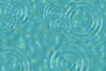 Raindrops On Pool Of Water Royalty Free Stock Photo