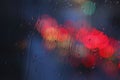 Raindrops and red lights Royalty Free Stock Photo