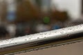 raindrops on stainless inox fence selective focus