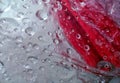 Raindrops wet the plastic surface. Wet plastic package Royalty Free Stock Photo
