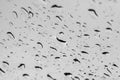 Raindrops on the window close up. rain drops on the glass macro. water drops falling down on window. rainy day Royalty Free Stock Photo