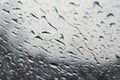 Raindrops on the window close up. rain drops on the glass macro. water drops falling down on window. rainy day Royalty Free Stock Photo