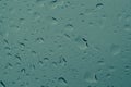 Raindrops on the window close up. rain drops on the glass macro. water drops falling down on window. rainy day Royalty Free Stock Photo