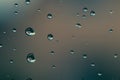 Raindrops on window glass close up. water drops abstract macro background Royalty Free Stock Photo