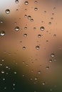 Raindrops on window glass close up. water drops abstract macro background Royalty Free Stock Photo