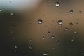 Raindrops on window glass close up. water drops abstract macro background Royalty Free Stock Photo