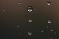Raindrops on window glass close up. water drops abstract macro background Royalty Free Stock Photo