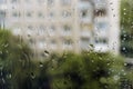 Raindrops on window glass, rainy day, looking trough window Royalty Free Stock Photo