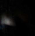 Raindrops on window glass and reflections, abtract Royalty Free Stock Photo