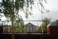 Raindrops on window pane. Blurred background outside the window in the rain Royalty Free Stock Photo