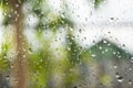 Raindrops on window pane. Blurred background outside the window in the rain Royalty Free Stock Photo