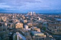 Raindrops on a window pane of glass with blurred background of River Thames and City of London