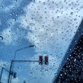 Raindrops on the windshield of the car in the rain Royalty Free Stock Photo