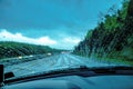 Raindrops on the windshield The view from the inside of the car, driving in the rain Royalty Free Stock Photo