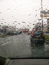 Raindrops on the windshield. View from inside the car