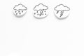 Rainfall forecast concept. Weather icons. Rainy cloud, lightening on white background top view copy space