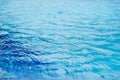 Raining drops in the swimming pool, soft focus and blur Royalty Free Stock Photo
