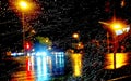 Raining night at a crossroads Royalty Free Stock Photo