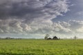 Raining sunny day ober Dutch farmland Royalty Free Stock Photo