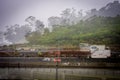 Raining but work at port continues Royalty Free Stock Photo