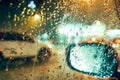 Rainny mood shade of light drop water rain background on car mirror vision. Royalty Free Stock Photo