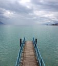 The rainstorm comes near a pier on the Lake Geneva, Switzerland, Europe