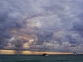 Rainstorm in a sea at sunrise Royalty Free Stock Photo