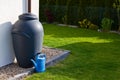 Rainwater barrel downspout modern design house exterior Royalty Free Stock Photo