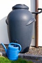 Rainwater barrel downspout modern design house exterior Royalty Free Stock Photo