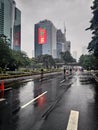 rainy car free day in jakarta sunday morning