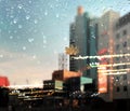 rainy city   modern buildings evening blurred bokeh light street decoration and illumination and Autumn leaves fall urban scene Royalty Free Stock Photo